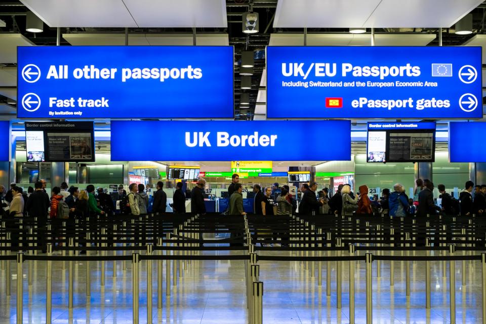 Passport control lanes at airport: "UK/EU" and "All other passports"