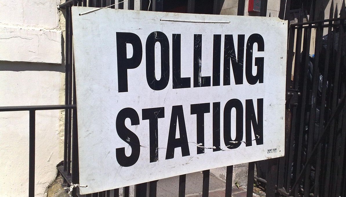 "polling station" sign